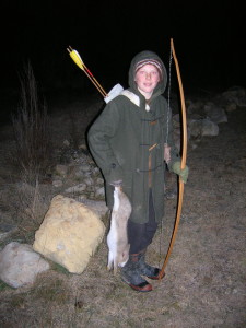 rabbit hunting with bow and arrow